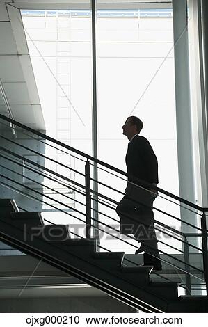 Caucasian businessman in modern office View Large Photo Image Stock Image - Caucasian businessman in modern office. Fotosearch