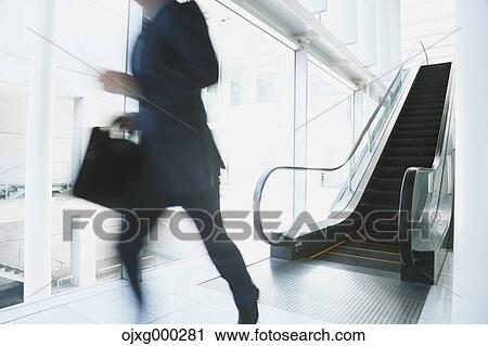 Caucasian businessman in modern office View Large Photo Image Stock Image - Caucasian businessman in modern office. Fotosearch