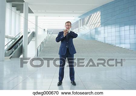 Caucasian businessman in modern office View Large Photo Image Stock Image - Caucasian businessman in modern office. Fotosearch