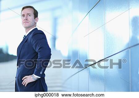 Caucasian businessman in modern office View Large Photo Image Stock Photo - Caucasian businessman in modern office. Fotosearch