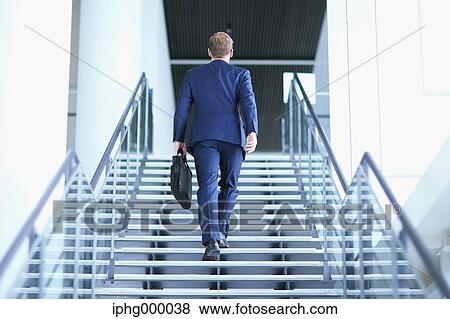 Caucasian businessman in modern office View Large Photo Image Stock Photo - Caucasian businessman in modern office. Fotosearch