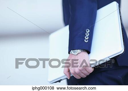 Caucasian businessman in modern office View Large Photo Image Stock Photo - Caucasian businessman in modern office. Fotosearch