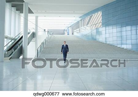 Caucasian businessman in modern office View Large Photo Image Stock Photo - Caucasian businessman in modern office. Fotosearch