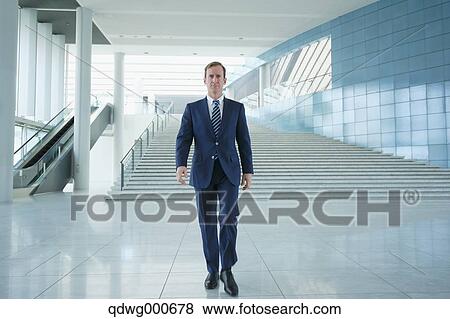 Caucasian businessman in modern office View Large Photo Image Stock Photo - Caucasian businessman in modern office. Fotosearch