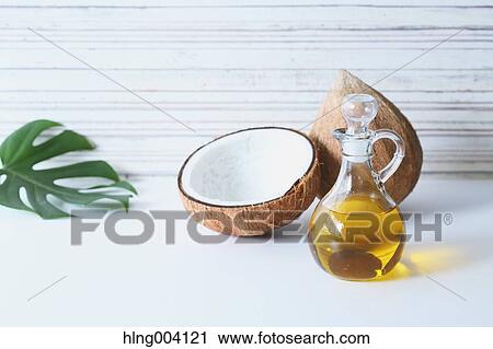 Stock Image - Coconuts oil. Fotosearch