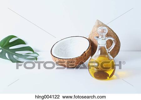 Stock Image - Coconuts oil. Fotosearch