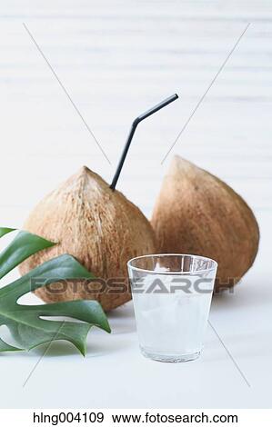 Stock Photo - Coconuts oil. Fotosearch