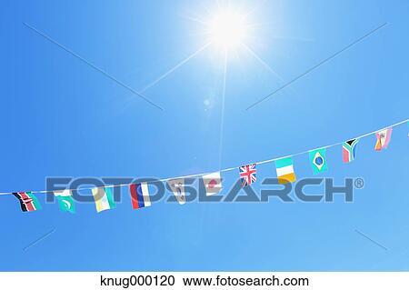 Stock Image - Flags in the wind. Fotosearch