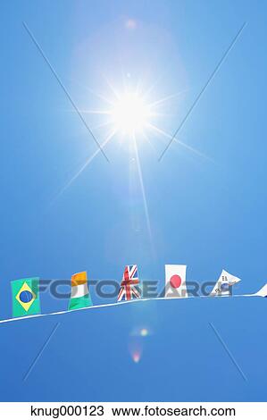 Flags in the wind View Large Photo Image Stock Image - Flags in the wind. Fotosearch