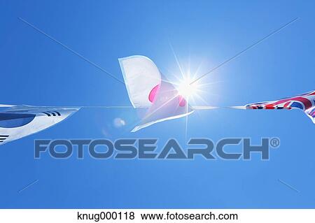 Stock Photo - Flags in the wind. Fotosearch