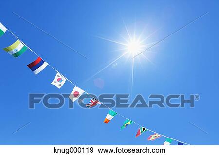 Flags in the wind View Large Photo Image Stock Photo - Flags in the wind. Fotosearch