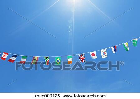 Flags in the wind View Large Photo Image Stock Photography - Flags in the wind. Fotosearch