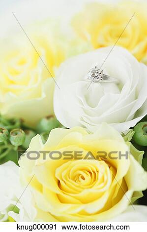 Flower bouquet and diamond ring View Large Photo Image Stock Image - Flower bouquet and diamond ring. Fotosearch