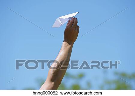 Flying paper plane View Large Photo Image Stock Image - Flying paper plane. Fotosearch