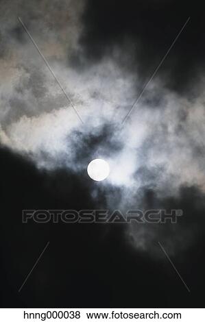 Stock Photo - Full moon and clouded night sky. Fotosearch