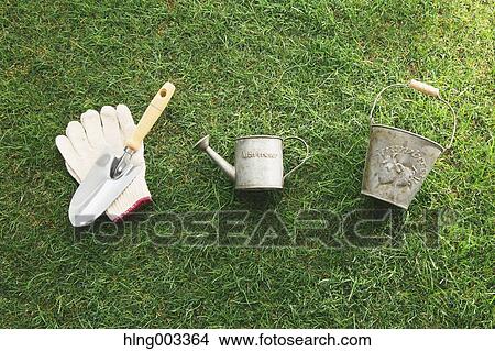 Gardening tools on grass View Large Photo Image Picture - Gardening tools on grass. Fotosearch