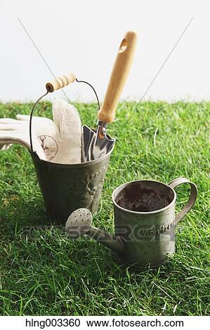 Gardening tools on grass View Large Photo Image Stock Image - Gardening tools on grass. Fotosearch