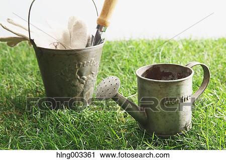 Gardening tools on grass View Large Photo Image Stock Image - Gardening tools on grass. Fotosearch