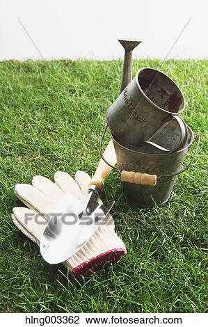 Gardening tools on grass View Large Photo Image Stock Image - Gardening tools on grass. Fotosearch