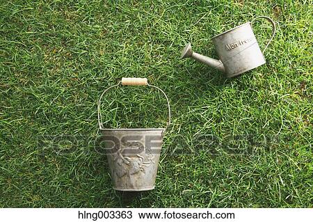 Gardening tools on grass View Large Photo Image Stock Image - Gardening tools on grass. Fotosearch