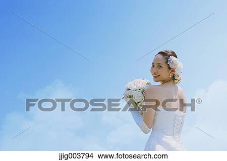 Japanese attractive bride in a city park View Large Photo Image Picture - Japanese attractive bride in a city park. Fotosearch