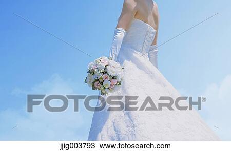 Japanese attractive bride in a city park View Large Photo Image Stock Image - Japanese attractive bride in a city park. Fotosearch