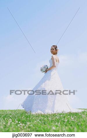 Stock Photo - Japanese attractive bride in a city park. Fotosearch