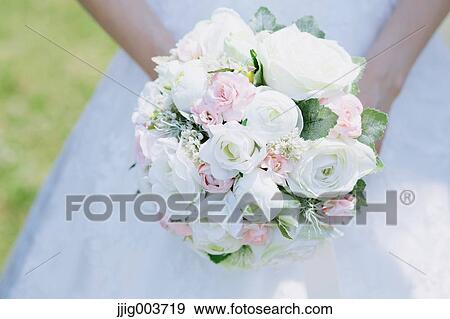 Japanese attractive bride in a city park View Large Photo Image Stock Photo - Japanese attractive bride in a city park. Fotosearch