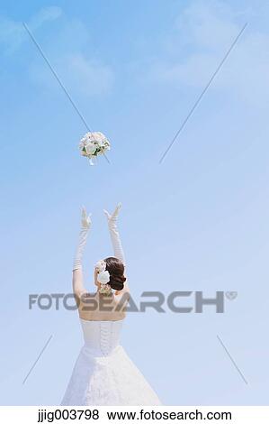Japanese attractive bride in a city park View Large Photo Image Stock Photo - Japanese attractive bride in a city park. Fotosearch