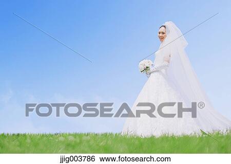 Japanese attractive bride in a city park View Large Photo Image Stock Photograph - Japanese attractive bride in a city park. Fotosearch