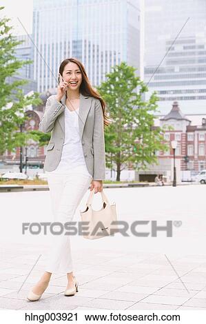 Japanese attractive businesswoman in downtown Tokyo View Large Photo Image Stock Image - Japanese attractive businesswoman in downtown Tokyo. Fotosearch