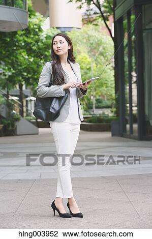 Japanese attractive businesswoman in downtown Tokyo View Large Photo Image Stock Image - Japanese attractive businesswoman in downtown Tokyo. Fotosearch