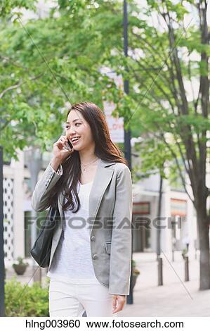Japanese attractive businesswoman in downtown Tokyo View Large Photo Image Stock Image - Japanese attractive businesswoman in downtown Tokyo. Fotosearch