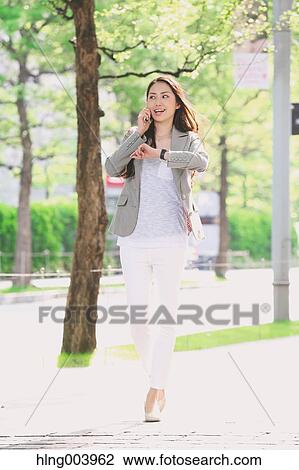 Japanese attractive businesswoman in downtown Tokyo View Large Photo Image Stock Image - Japanese attractive businesswoman in downtown Tokyo. Fotosearch