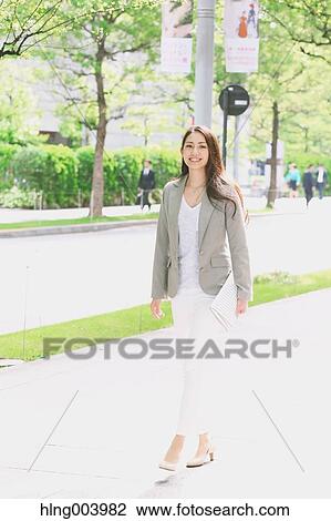Japanese attractive businesswoman in downtown Tokyo View Large Photo Image Stock Image - Japanese attractive businesswoman in downtown Tokyo. Fotosearch