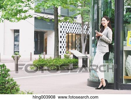 Japanese attractive businesswoman in downtown Tokyo View Large Photo Image Stock Photo - Japanese attractive businesswoman in downtown Tokyo. Fotosearch