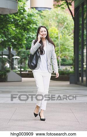 Japanese attractive businesswoman in downtown Tokyo View Large Photo Image Stock Photo - Japanese attractive businesswoman in downtown Tokyo. Fotosearch