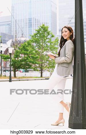Japanese attractive businesswoman in downtown Tokyo View Large Photo Image Stock Photo - Japanese attractive businesswoman in downtown Tokyo. Fotosearch
