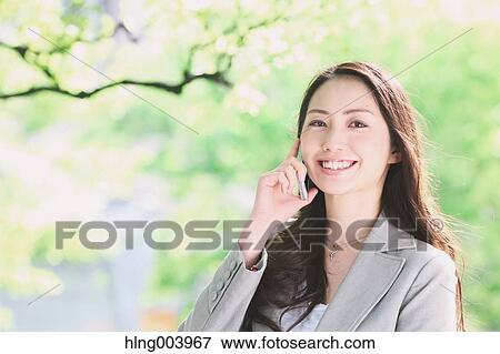 Japanese attractive businesswoman in downtown Tokyo View Large Photo Image Stock Photo - Japanese attractive businesswoman in downtown Tokyo. Fotosearch