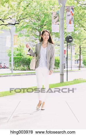 Japanese attractive businesswoman in downtown Tokyo View Large Photo Image Stock Photo - Japanese attractive businesswoman in downtown Tokyo. Fotosearch