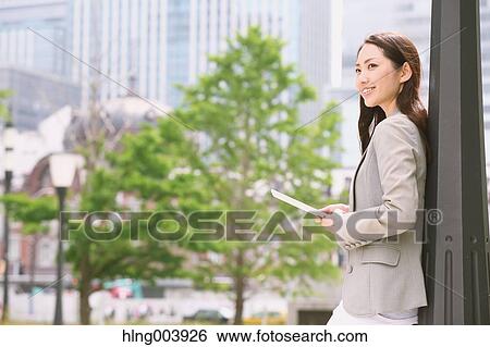 Japanese attractive businesswoman in downtown Tokyo View Large Photo Image Stock Photograph - Japanese attractive businesswoman in downtown Tokyo. Fotosearch