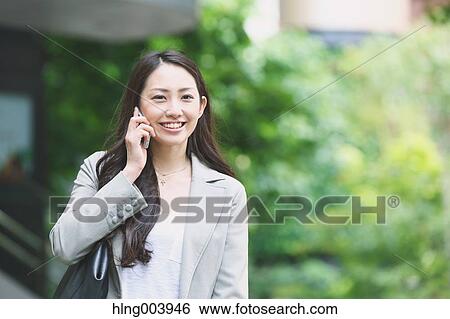 Japanese attractive businesswoman in downtown Tokyo View Large Photo Image Stock Photograph - Japanese attractive businesswoman in downtown Tokyo. Fotosearch