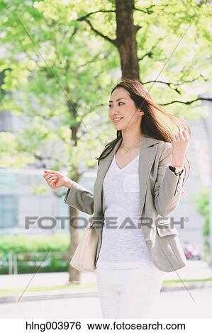Japanese attractive businesswoman in downtown Tokyo View Large Photo Image Stock Photograph - Japanese attractive businesswoman in downtown Tokyo. Fotosearch
