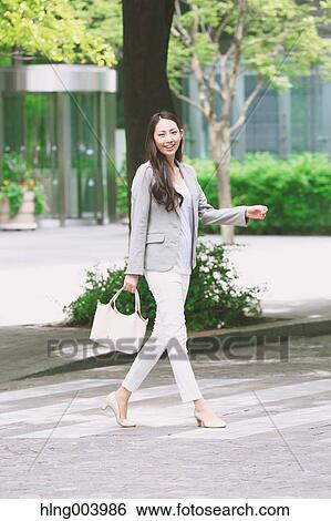 Japanese attractive businesswoman in downtown Tokyo View Large Photo Image Stock Photograph - Japanese attractive businesswoman in downtown Tokyo. Fotosearch