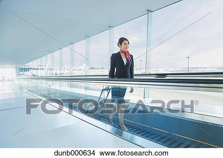 Japanese attractive flight attendant at the airport View Large Photo Image Picture - Japanese attractive flight attendant at the airport. Fotosearch