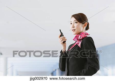 Japanese attractive flight attendant at the airport View Large Photo Image Stock Image - Japanese attractive flight attendant at the airport. Fotosearch