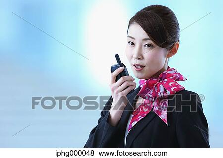 Japanese attractive flight attendant at the airport View Large Photo Image Stock Photo - Japanese attractive flight attendant at the airport. Fotosearch