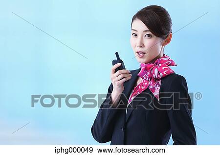 Japanese attractive flight attendant at the airport View Large Photo Image Stock Photo - Japanese attractive flight attendant at the airport. Fotosearch