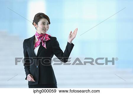 Japanese attractive flight attendant at the airport View Large Photo Image Stock Photo - Japanese attractive flight attendant at the airport. Fotosearch
