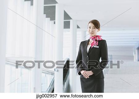 Japanese attractive flight attendant at the airport View Large Photo Image Stock Photo - Japanese attractive flight attendant at the airport. Fotosearch